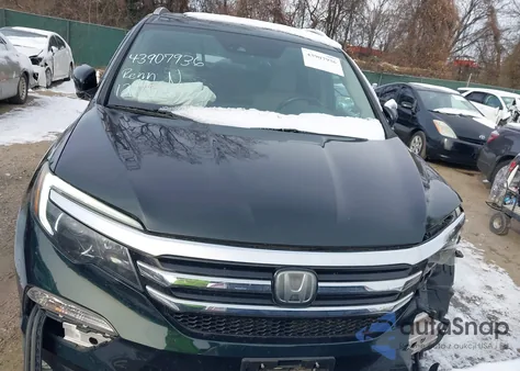 2018 Honda Pilot Elite from USA, damaged, VIN 5FNYF6H00JB043247